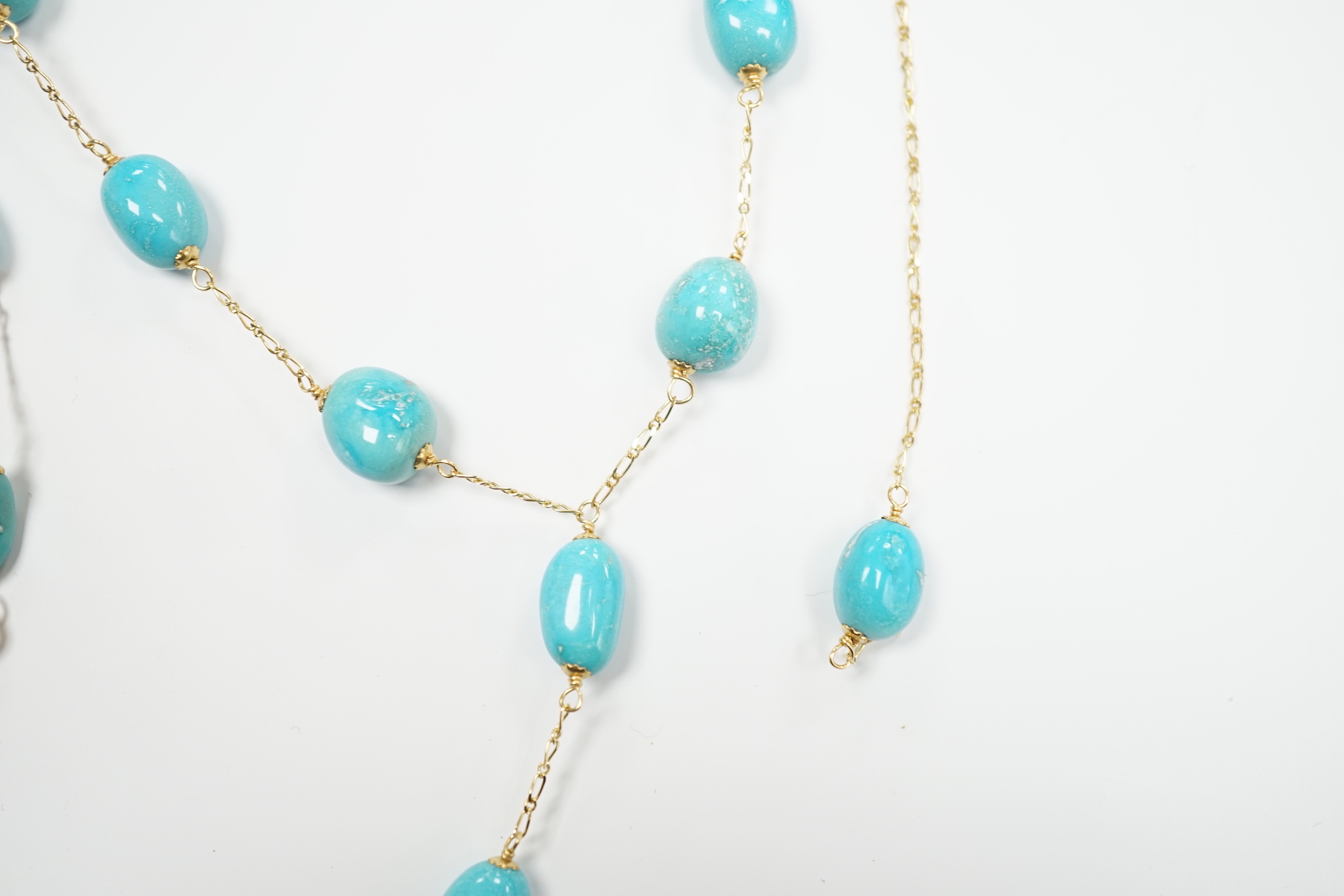 A modern Italian 750 and turquoise set drop necklace (a.f.), 54cm and a matching bracelet, gross weight 24.6 grams.